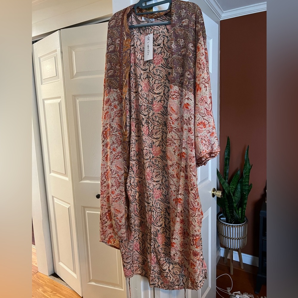 Long sleeve, very light weight outer cover up. From 12th Tribe. Never been worn